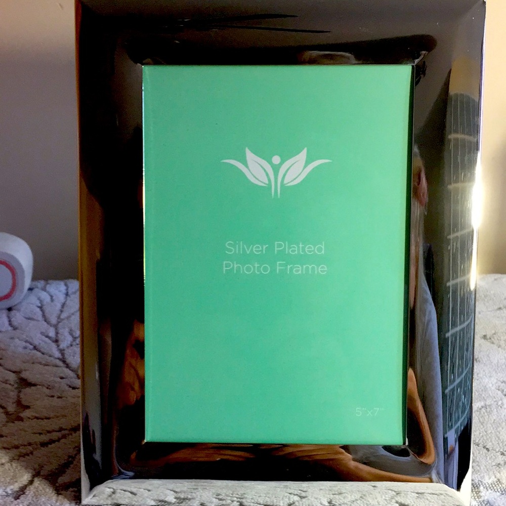 Silver plated frame new in box 9.5X7.5’